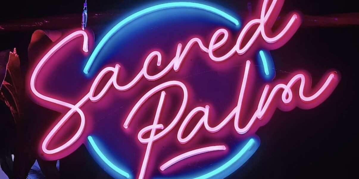 Sacred Palm bar neon signs in Columbus