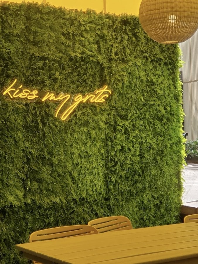 kiss my grits Tupelo Honey Southern Kitchen & Bar neon sign