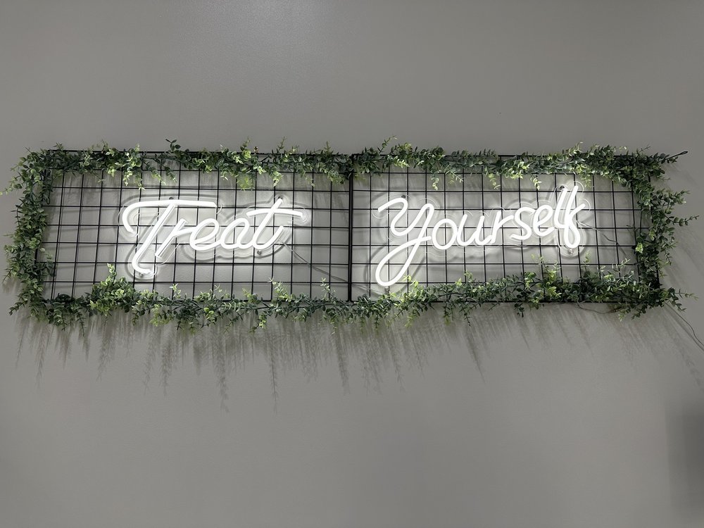 treat yourself cafe neon signs in Nashville