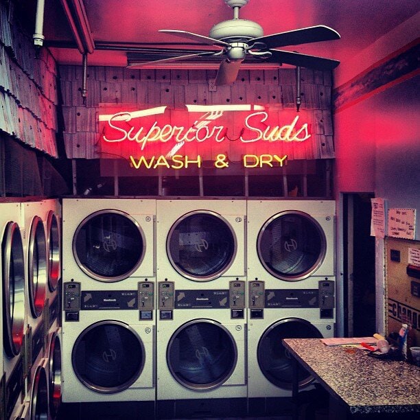 Custom wash and dry laundromat neon sign in red and yellow