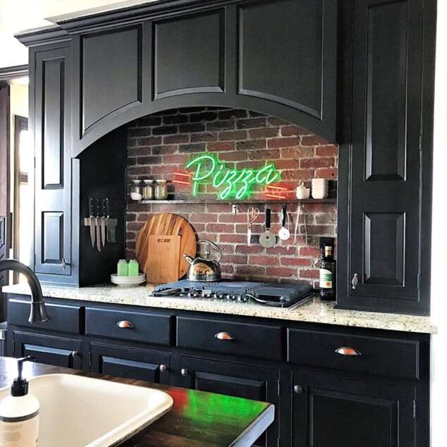 Green pizza neon sign for a kitchen with dark cabinets